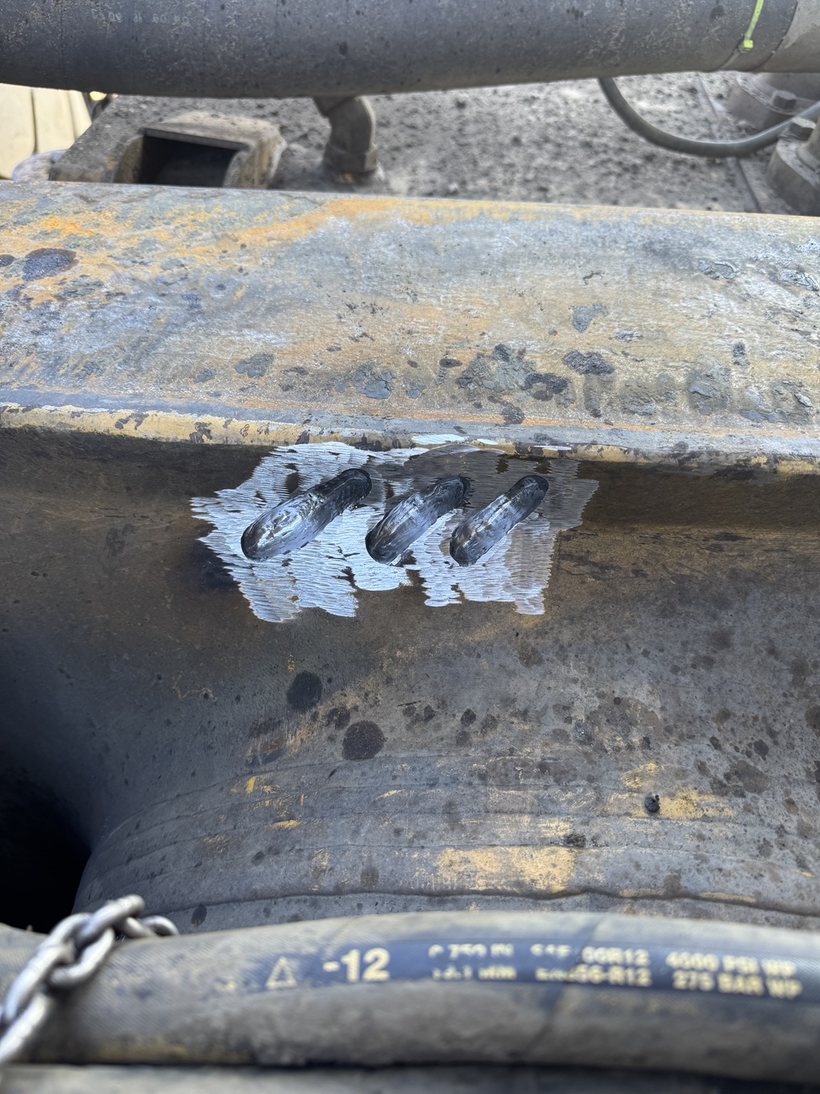 Heavy equipment repair area prepared for welding